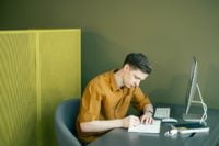 a guy is writing