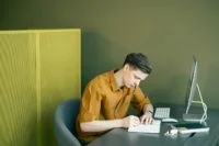 a guy is writing