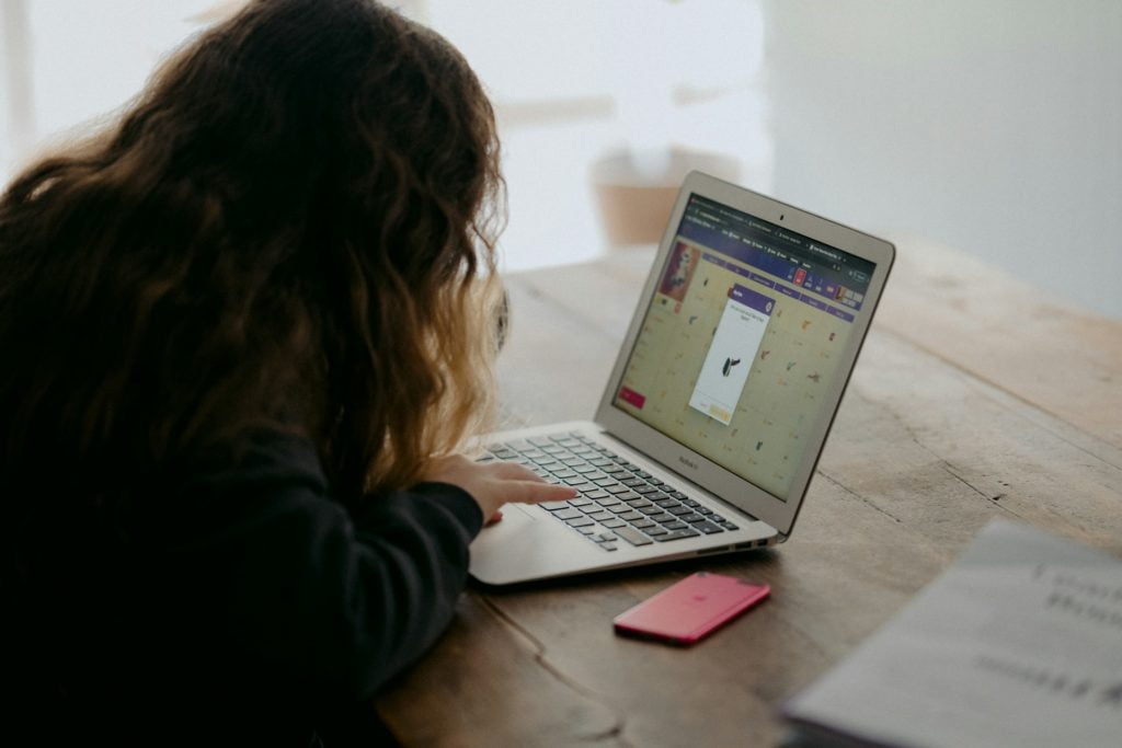 a girl with a laptop